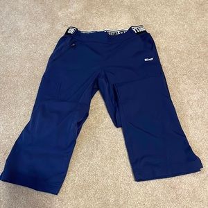 Navy blue scrub pants and matching scrub jacket